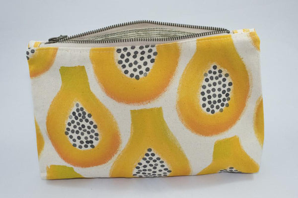 truly unique hand painted papaya clutch, made on Maui